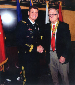 General Votel presents Bill Knight with Jack Knight's CHOH Medal